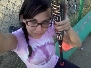 A mortifyingly cringe selfie of me with a baseball bat. 